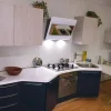 Cucina Dibiesse moderna con penisola grigio in laccato lucido Sfera