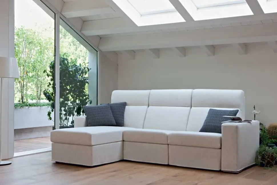 Divano con penisola in stile Design Con movimento relax a prezzi convenienti