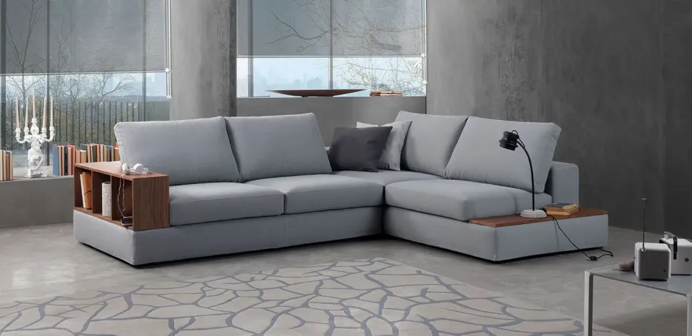 Divano Excò Divano mod-lerroy rivestito in tessuto ad angolo,in promo-sconto del 50% PREZZI OUTLET sconto 50%