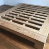 Letto in legno con giroletto Giroletto slat teak massello Artigianale a prezzo scontato