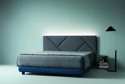 Letto matrimoniale con gambe Opus Caccaro a prezzo scontato