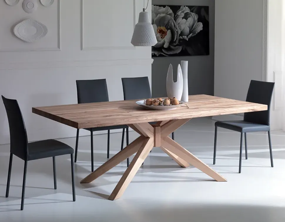 TAVOLO IN VETRO CON BASAMENTO CENTRALE A STELLA